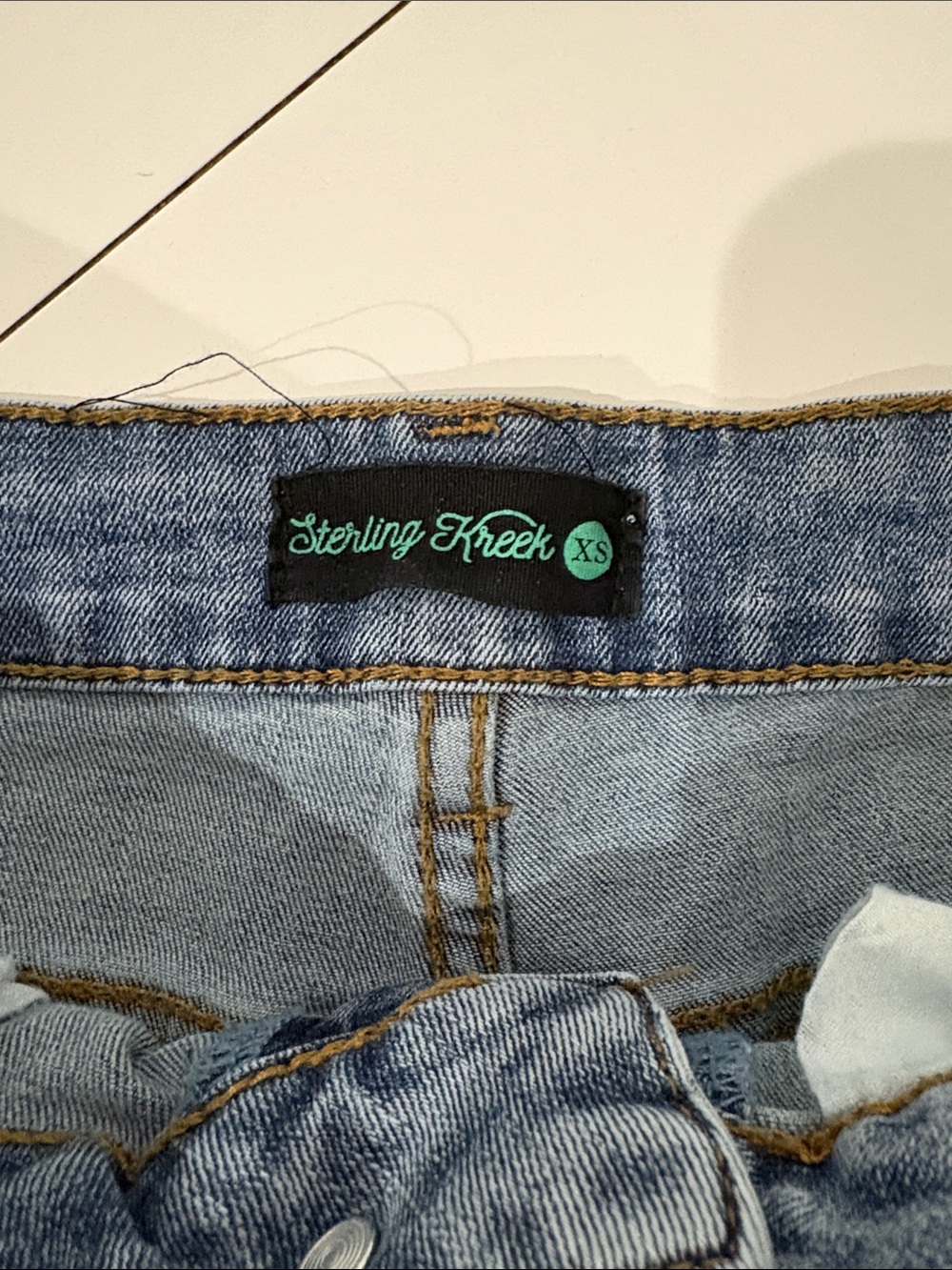 Sterling Kreek High-Rise Blue Denim Jean Shorts with Subtle Rhinestone Detail - Picture 2 of 3